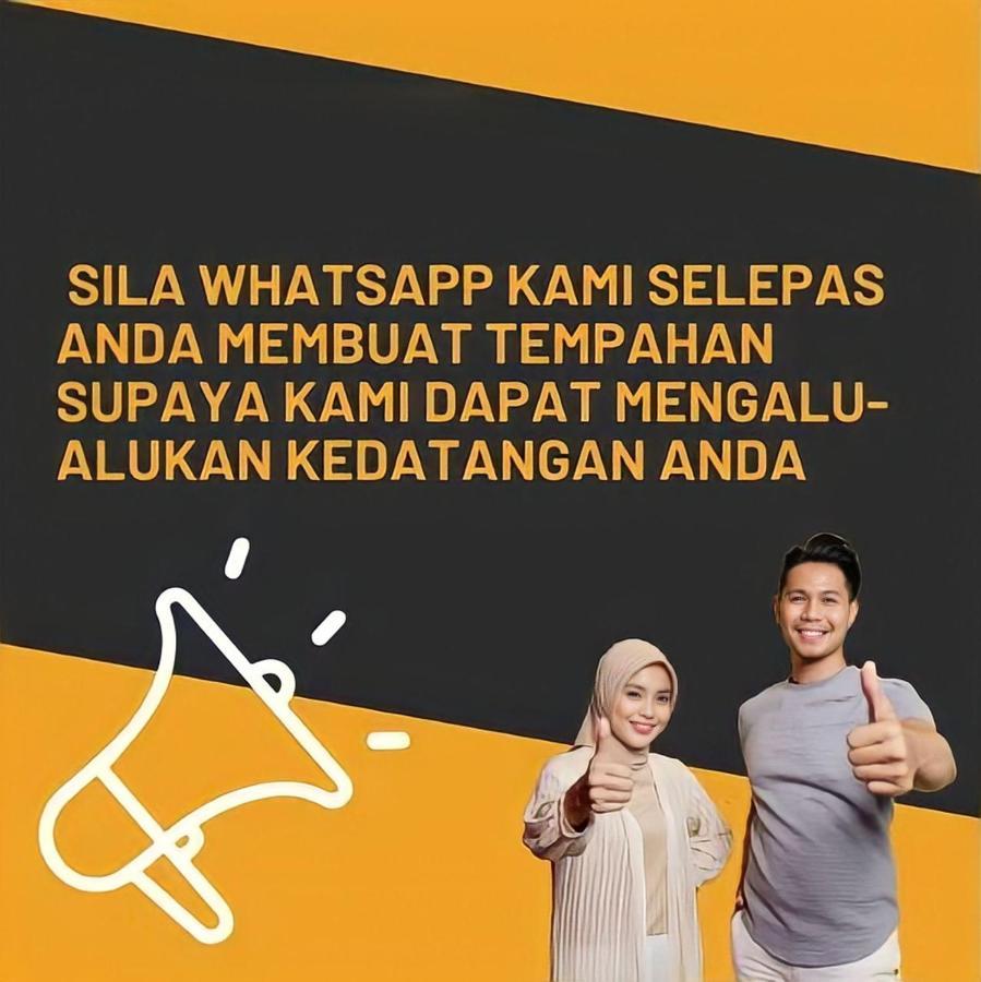 Sinar Rasa Homestay At I-Soho, I-City Shah Alam Buitenkant foto A poster from the National Security Council of Malaysia, asking people to stop spreading fake news via WhatsApp.